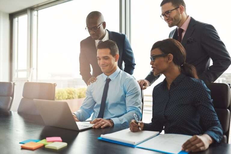 happy-group-of-business-people-in-office